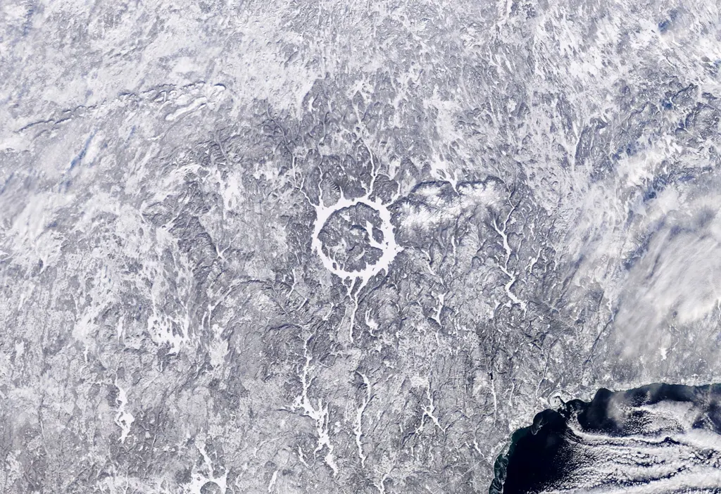 Manicouagan Crater, an ancient impact crater in Quebec, Canada, seen from orbit. Shown for illustration; it is not a carbonado site.